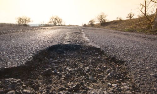 potholes or depressions in driveway